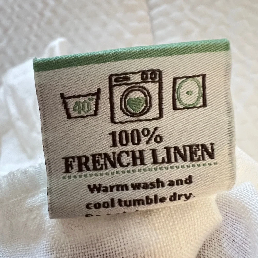 The White Linen Farmhouse brand white